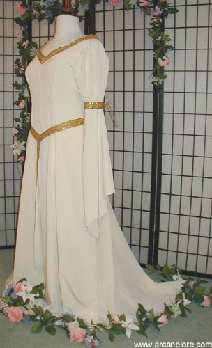 white wedding dress with gold trim